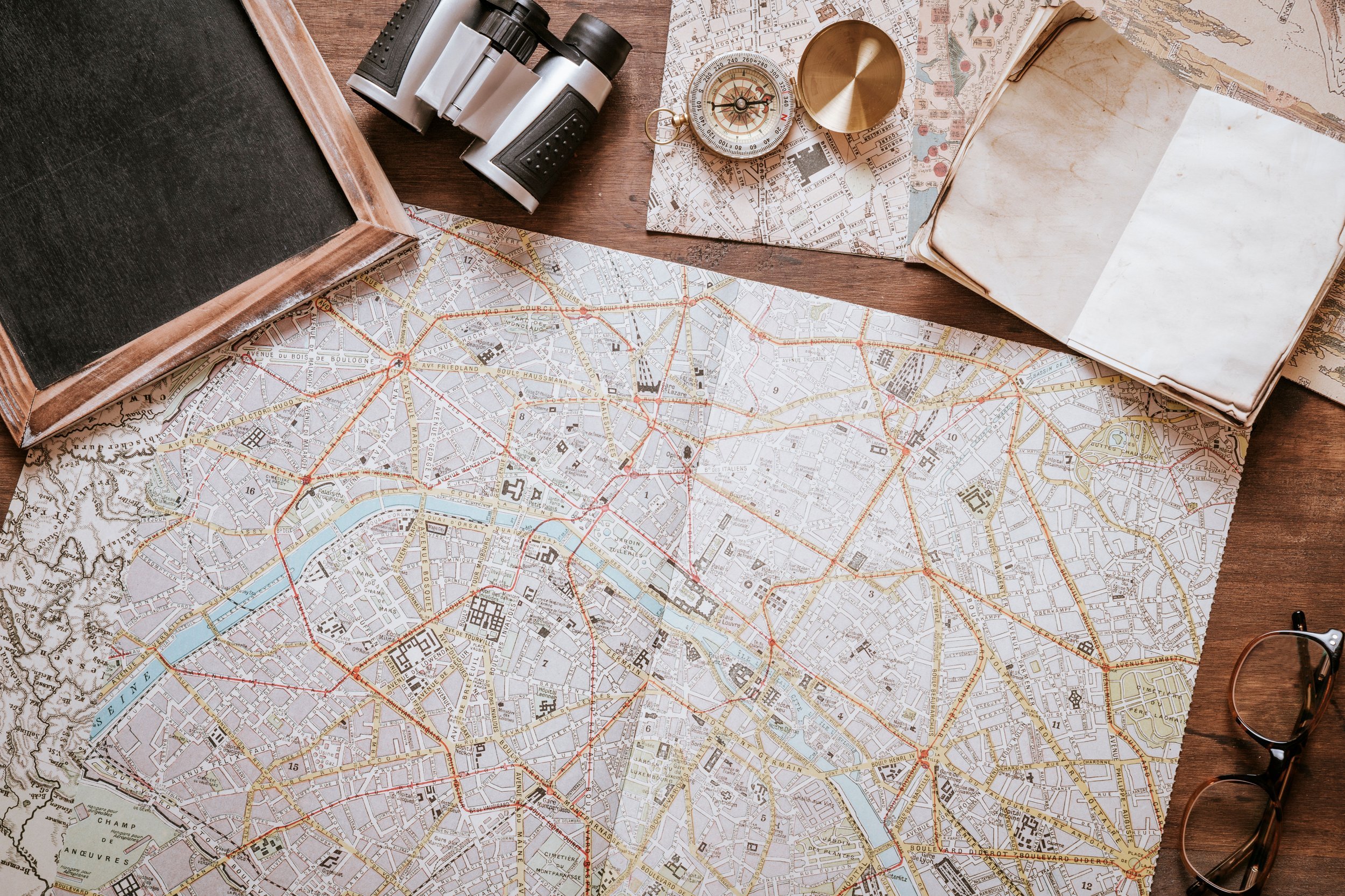 Vintage map and compass on a desk